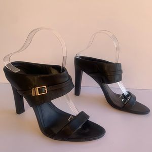 Calvin Klein black high heel mules, gold accents